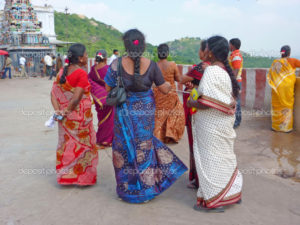 KANCHIPURAM, INDIA - NOV 27 - Hindu women prepare to enter the temple  on Nov 27, 2009 near Kanchipuram, India